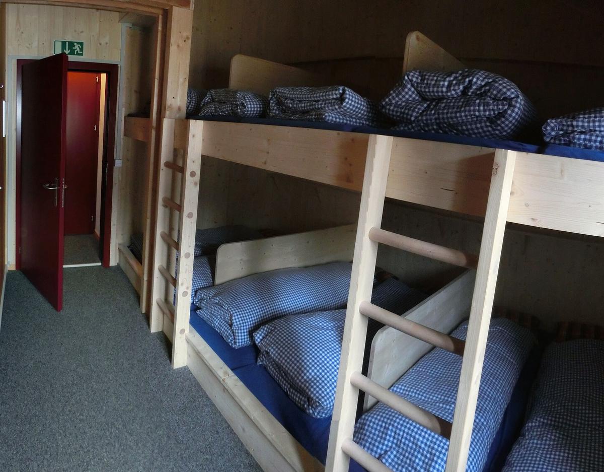 hut dormitory bunks mountains